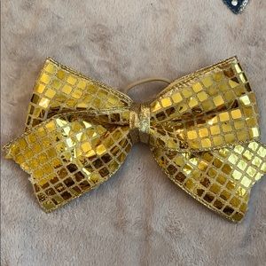 A cheerleading bow🎀